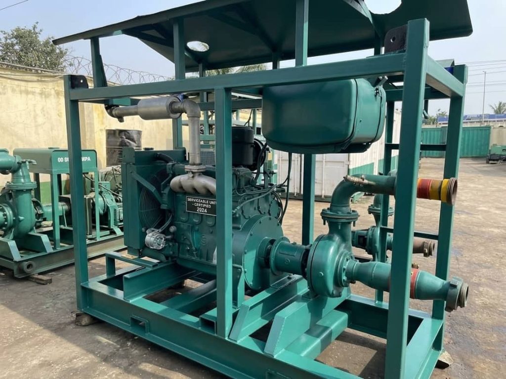 Engine-driven centrifugal pump unit on a green skid, tagged as a certified serviceable unit